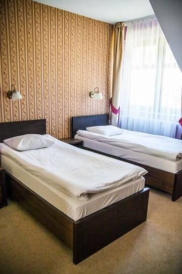 Фото номера Двухместный номер с 1 кроватью или 2 отдельными кроватями Отель Hotel Korona г. Рыбник 8