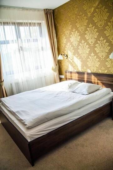 Фото номера Двухместный номер с 1 кроватью или 2 отдельными кроватями Отель Hotel Korona г. Рыбник 10
